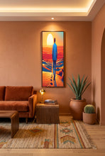 Load image into Gallery viewer, A canvas art print featuring an illustration of an African man in a blue suit walking through a desert landscape at sunset.