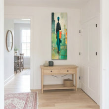 Load image into Gallery viewer, Narrow hallway with a wooden console table and colorful abstract painting on the wall.