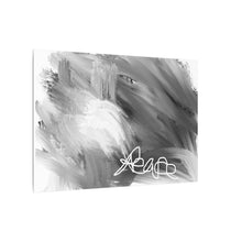 Load image into Gallery viewer, Abstract black and white canvas wall art featuring expressive brushstrokes and a white line-art signature in the lower right, shown at a slight angle on a white background.
