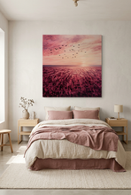 Load image into Gallery viewer, Fields of Flight lavender landscape canvas wall art with birds hanging above a bed in a calm neutral bedroom
